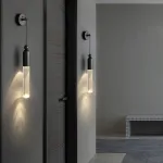 Настенный бра-светильник с прозрачным цилиндрическим корпусом и шарообразным клипом из латуни GELIS WALL Brass от ImperiumLoft