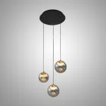 Серия подвесных светильников с LED-источниками света в полусферических рассеивателях с эффектом льда внутри шарообразных плафонов из тонированного стекла MAYER ORB L3 от ImperiumLoft