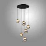 Серия подвесных светильников с LED-источниками света в полусферических рассеивателях с эффектом льда внутри шарообразных плафонов из тонированного стекла MAYER ORB L6 от ImperiumLoft