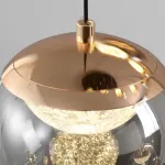 Серия подвесных светильников с LED-источниками света в полусферических рассеивателях с эффектом льда внутри шарообразных плафонов из тонированного стекла MAYER ORB L9 от ImperiumLoft