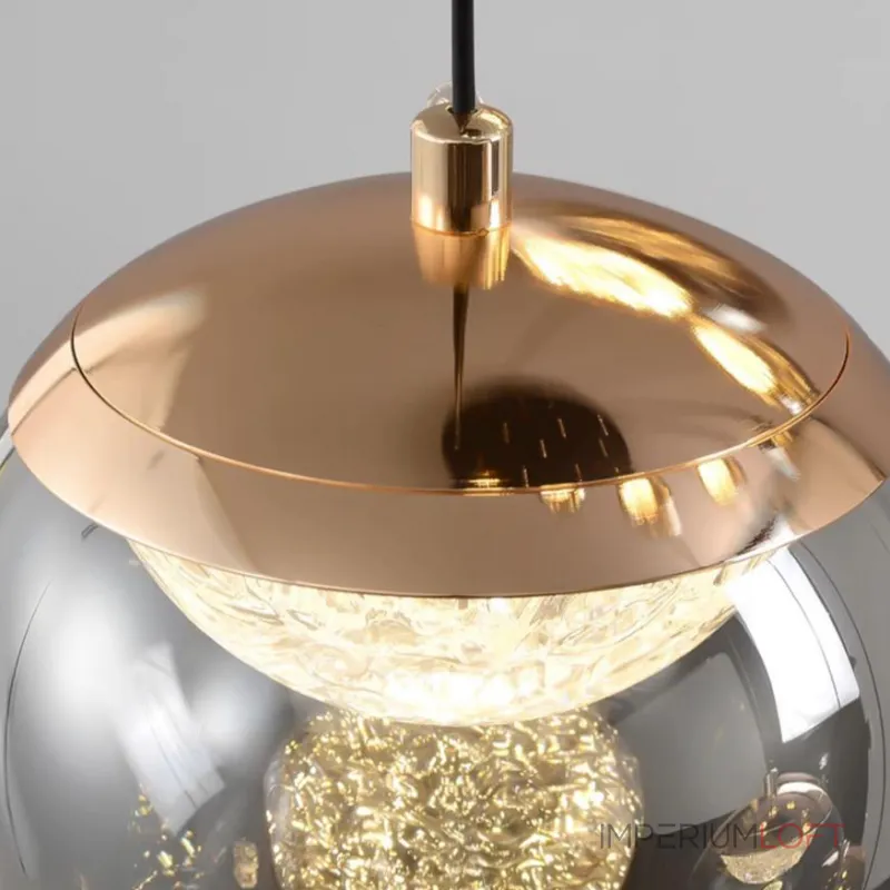 Серия подвесных светильников с LED-источниками света в полусферических рассеивателях с эффектом льда внутри шарообразных плафонов из тонированного стекла MAYER ORB L9 от ImperiumLoft