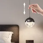 Серия подвесных светильников с LED-источниками света в полусферических рассеивателях с эффектом льда внутри шарообразных плафонов EMMERT Gold от ImperiumLoft
