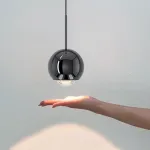 Серия подвесных светильников шарообразной формы с линзированным LED-источником и регулировкой угла наклона TAVE Gold 3000К с лифтом от ImperiumLoft