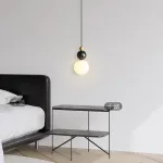 Серия подвесных светильников в виде комбинации мраморного и металлического шаров и круглого стеклянного плафона SONDRE L1 Green от ImperiumLoft