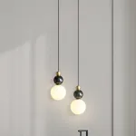 Серия подвесных светильников в виде комбинации мраморного и металлического шаров и круглого стеклянного плафона SONDRE L1 Green от ImperiumLoft