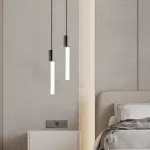 Серия подвесных светильников в виде светодиодных стержней на цилиндрическом основании из латуни TOSSENE H60 от ImperiumLoft