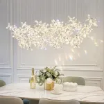 Серия инсталляций из подвесных хрустальных цветов, подсвеченных светодиодными источниками, расположенными на прямоугольном креплении CHARA L120 от ImperiumLoft