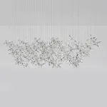 Серия инсталляций из подвесных хрустальных цветов, подсвеченных светодиодными источниками, расположенными на прямоугольном креплении CHARA L120 от ImperiumLoft