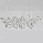 Серия инсталляций из подвесных хрустальных цветов, подсвеченных светодиодными источниками, расположенными на прямоугольном креплении CHARA L150 от ImperiumLoft