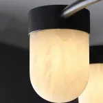 Серия подвесных светильников с округлыми плафонами из натурального алебастра TORVILL Brass от ImperiumLoft