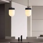 Серия подвесных светильников с округлыми плафонами из натурального алебастра TORVILL Brass от ImperiumLoft