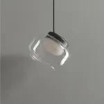 Серия светильников с мраморным рассеивателем внутри стеклянного плафона на ассиметричном подвесе DORIAN ONE L25 от ImperiumLoft