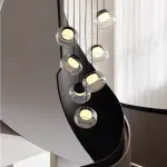 Серия светильников с мраморным рассеивателем внутри стеклянного плафона на ассиметричном подвесе DORIAN ONE L25 от ImperiumLoft