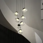 Серия светильников с мраморным рассеивателем внутри стеклянного плафона на ассиметричном подвесе DORIAN ONE L25 от ImperiumLoft