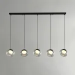 Серия светильников с мраморным рассеивателем внутри стеклянного плафона на ассиметричном подвесе DORIAN ONE L5 от ImperiumLoft