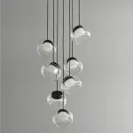 Серия светильников с мраморным рассеивателем внутри стеклянного плафона на ассиметричном подвесе DORIAN ONE L25 от ImperiumLoft