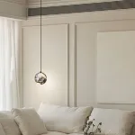 Серия подвесных светильников с шарообразным плафоном из натурального мрамора с фактурой Bulgary Stone и Молочного Нефрита BONN NEPHRITE Milk jade с лифтом от ImperiumLoft