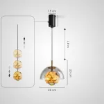 Серия подвесных светильников со стеклянным куполом и шарообразным плафоном из натурального мрамора с точечным источником света HENNEKE MARBLE Natural Marble с лифтом от ImperiumLoft