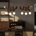 Серия оригинальных светильников из высококачественной древесины различных оттенков и латуни с тремя шарообразными плафонами REUBEN Light Brown от ImperiumLoft