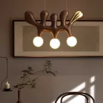 Серия оригинальных светильников из высококачественной древесины различных оттенков и латуни с тремя шарообразными плафонами REUBEN Light Brown от ImperiumLoft