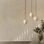 Подвесной светильник с составным плафоном из двух травертиновых полусфер POVL SPLIT от ImperiumLoft