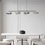 Линейный двунаправленный светильник с рядным расположением плафонов из мрамора с фактурой Bulgary Stone EILERT NEPHRITE LONG от ImperiumLoft