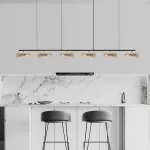 Серия светодиодных реечных люстр с прозрачными фактурными плафонами и двунаправленным светом EILERT LONG L126 от ImperiumLoft