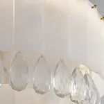 Светодиодный реечный светильник из мраморных пластин с декоративными хрустальными подвесками на удлиненном кольцевом каркасе LIDVALD LONG от ImperiumLoft