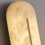 Настенный светильник с удлиненным рассеивателем из натурального испанского мрамора и центральным латунным клипом ALTON WALL Pitch от ImperiumLoft