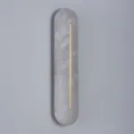 Настенный светильник с удлиненным рассеивателем из натурального испанского мрамора и центральным латунным клипом ALTON WALL Pitch от ImperiumLoft