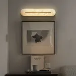 Настенный светильник с удлиненным рассеивателем из натурального испанского мрамора и центральным латунным клипом ALTON WALL Pitch от ImperiumLoft