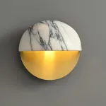 Серия настенных светильников с выгнутым рассеивателем в форме усеченной сферы из натурального мрамора VILHO R Brass от ImperiumLoft