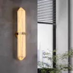 Серия светодиодных настенных светильников c удлиненным мраморным плафоном в форме кристалла ORTWIN Н60 Black от ImperiumLoft