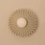 Серия настенных светильников с вогнутым рельефным корпусом из керамики и шарообразным плафоном в центре STEVEN Black от ImperiumLoft