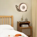 Светодиодный настенный светильник в виде улитки с корпусом терраццо из цемента STURLA от ImperiumLoft