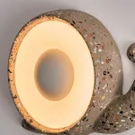 Светодиодный настенный светильник в виде улитки с корпусом терраццо из цемента STURLA от ImperiumLoft