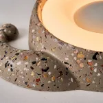 Светодиодный настенный светильник в виде улитки с корпусом терраццо из цемента STURLA от ImperiumLoft