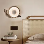 Светодиодный настенный светильник в виде улитки с корпусом терраццо из цемента STURLA от ImperiumLoft