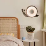 Светодиодный настенный светильник в виде улитки с корпусом терраццо из цемента STURLA от ImperiumLoft