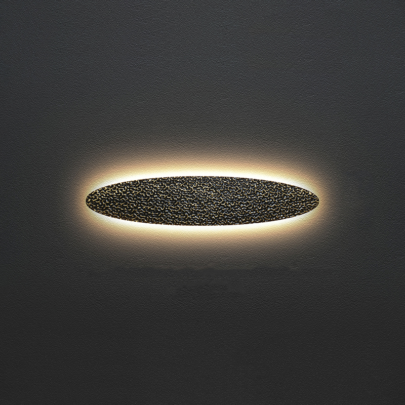 Серия светодиодных настенных светильников с латунным корпусом овальной формы и рельефной поверхностью с чернением MILIUS SHADE L121 от ImperiumLoft Серия светодиодных настенных светильников с латунным корпусом овальной формы и рельефной поверхностью с чернением MILIUS SHADE L121 от ImperiumLoft