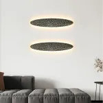 Серия светодиодных настенных светильников с латунным корпусом овальной формы и рельефной поверхностью с чернением MILIUS SHADE L41 от ImperiumLoft