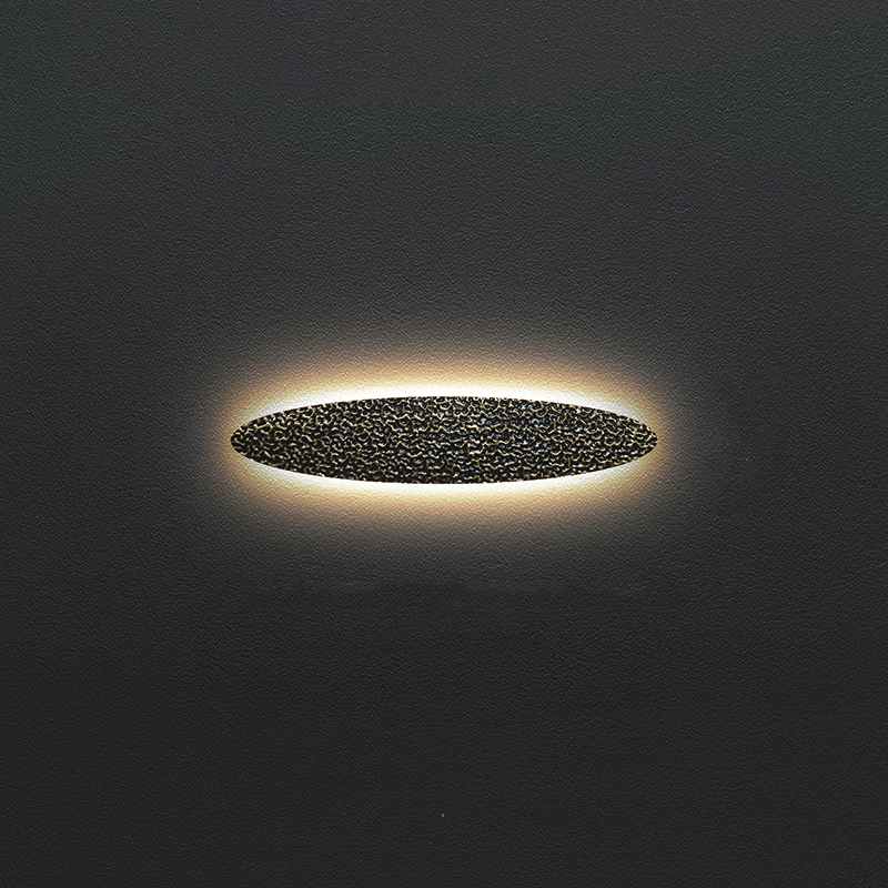 Серия светодиодных настенных светильников с латунным корпусом овальной формы и рельефной поверхностью с чернением MILIUS SHADE L101 от ImperiumLoft Серия светодиодных настенных светильников с латунным корпусом овальной формы и рельефной поверхностью с чернением MILIUS SHADE L101 от ImperiumLoft