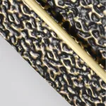 Серия светодиодных настенных светильников с латунным корпусом овальной формы и рельефной поверхностью с чернением MILIUS OVAL L100 от ImperiumLoft