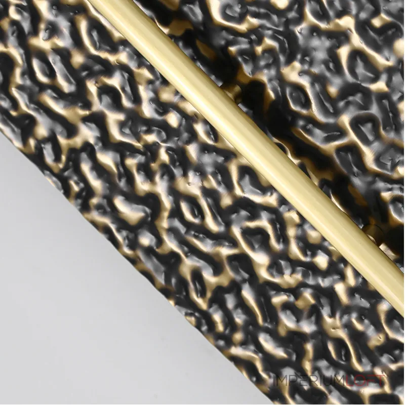 Серия светодиодных настенных светильников с латунным корпусом овальной формы и рельефной поверхностью с чернением MILIUS OVAL L100 от ImperiumLoft