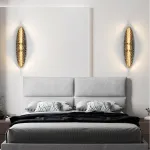 Серия светодиодных настенных светильников с латунным корпусом овальной формы и рельефной поверхностью с чернением MILIUS OVAL L100 от ImperiumLoft