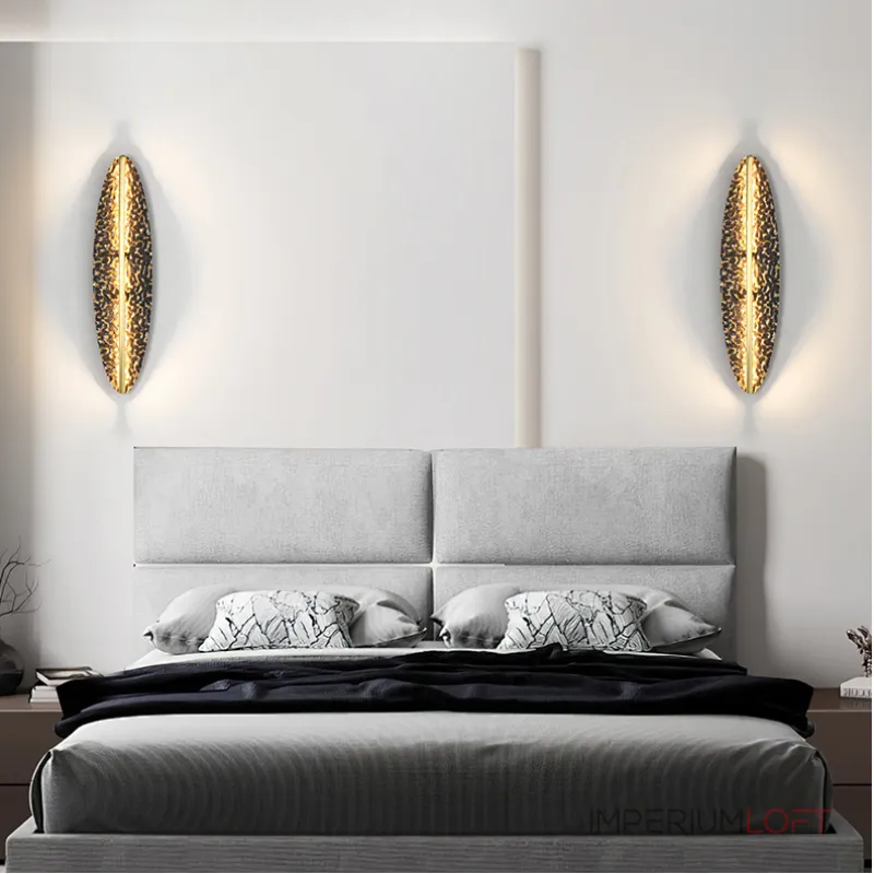 Серия светодиодных настенных светильников с латунным корпусом овальной формы и рельефной поверхностью с чернением MILIUS OVAL L100 от ImperiumLoft