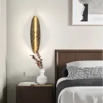 Серия светодиодных настенных светильников с латунным корпусом овальной формы и рельефной поверхностью с чернением MILIUS OVAL L100 от ImperiumLoft