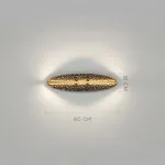 Серия светодиодных настенных светильников с латунным корпусом овальной формы и рельефной поверхностью с чернением MILIUS OVAL L60 от ImperiumLoft