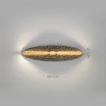 Серия светодиодных настенных светильников с латунным корпусом овальной формы и рельефной поверхностью с чернением MILIUS OVAL L80 от ImperiumLoft