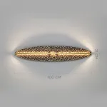 Серия светодиодных настенных светильников с латунным корпусом овальной формы и рельефной поверхностью с чернением MILIUS OVAL L100 от ImperiumLoft